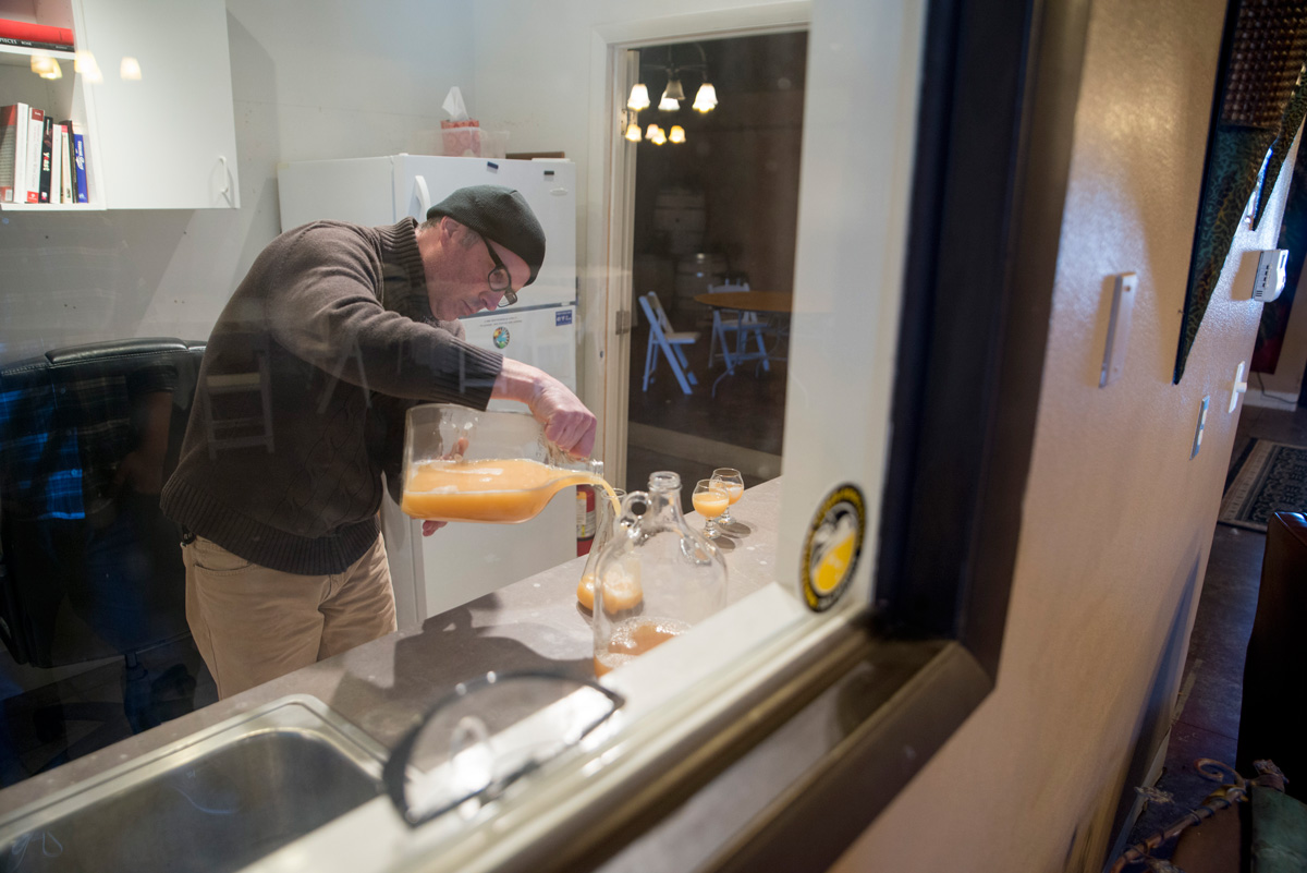 Chris mixing cider and apple juice