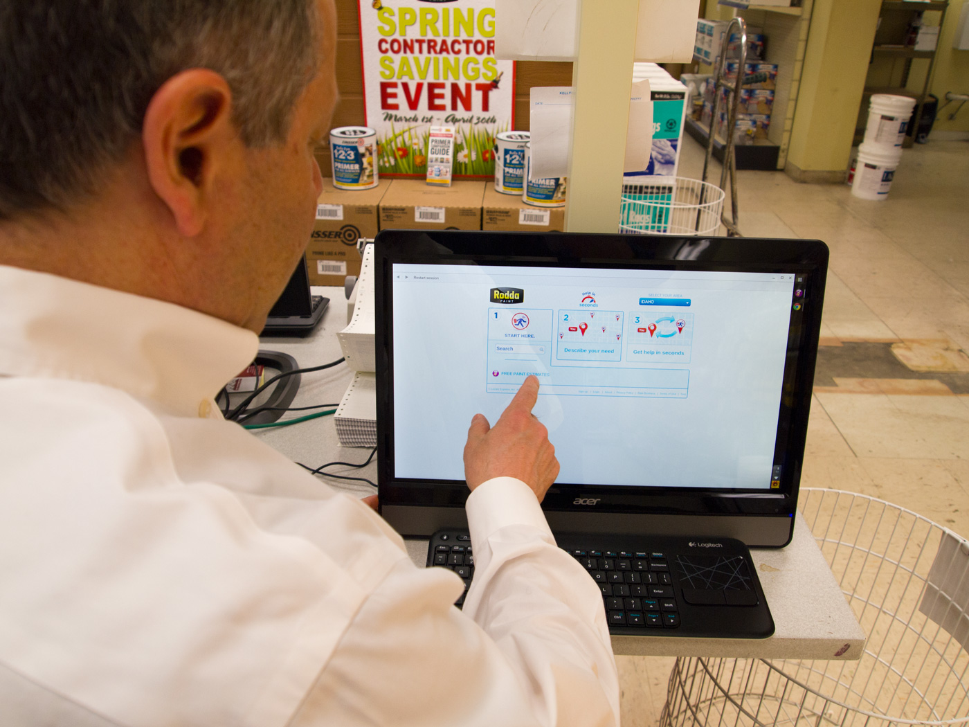 Locate Express owner Doug Joseph using a Locate Express kiosk