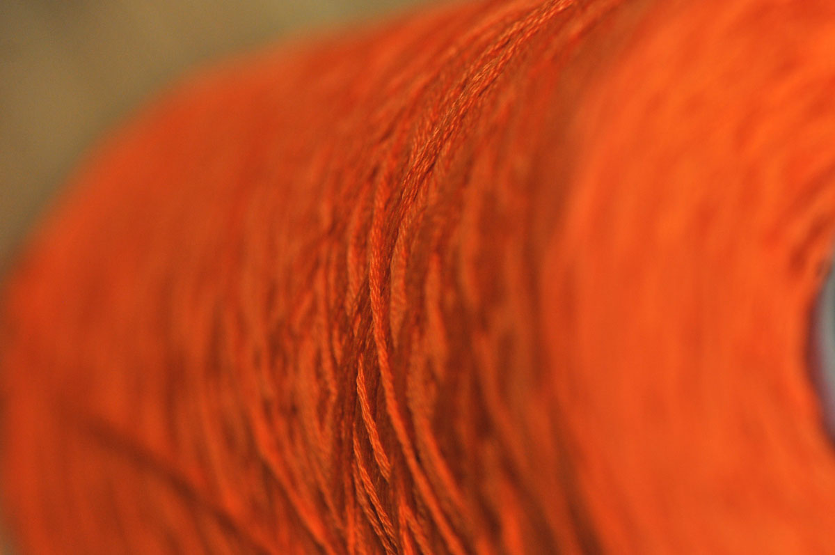 The Stitch orange thread