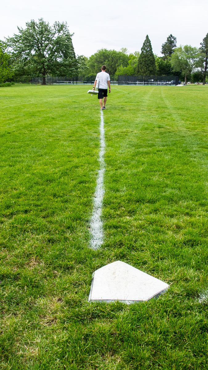 Gameday Sports Leagues founder Eric Leaman prepping the field for a kickball match