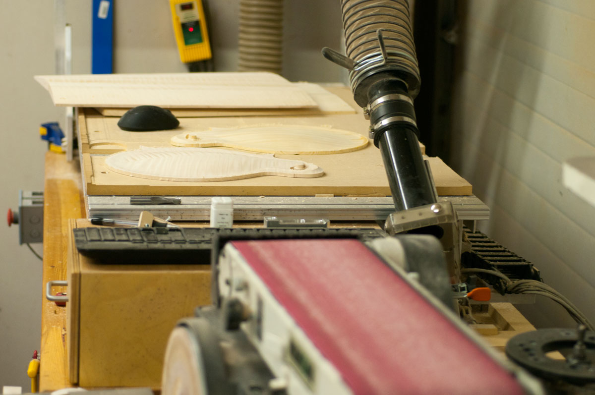 Industrial sander at the Clark Mandolin wood shop