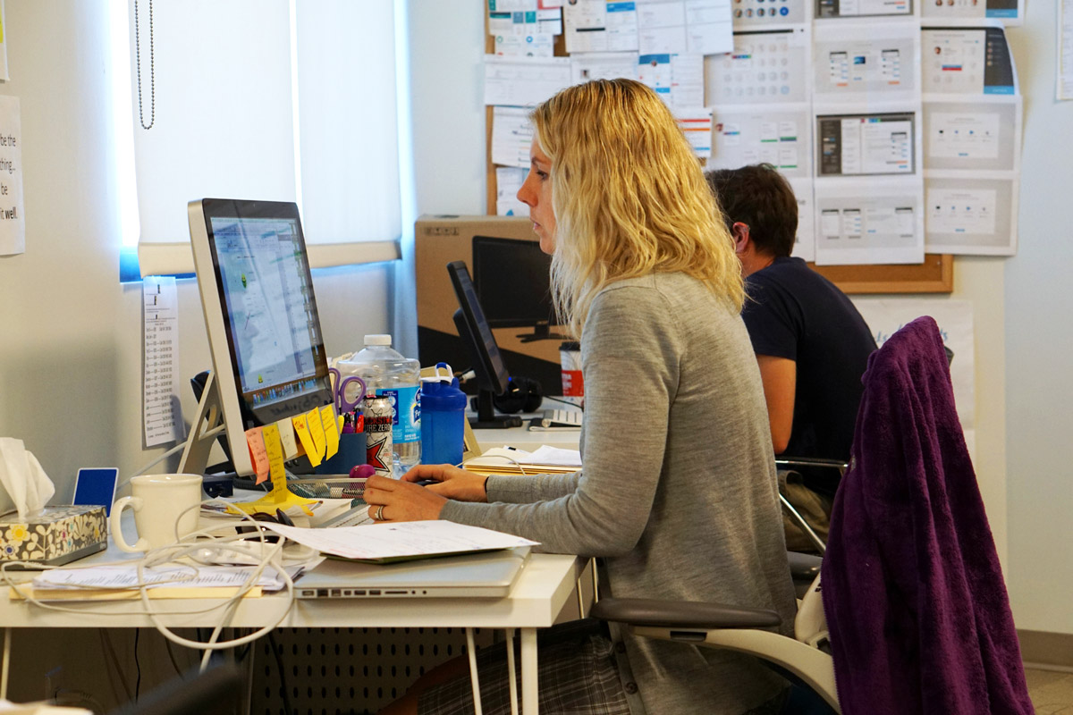 Refer.com office, people hard at work