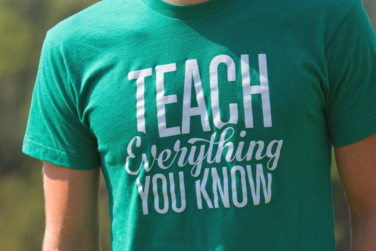 ConvertKit founder Nathan Barry wearing his "Teach Everything You Know" t-shirt
