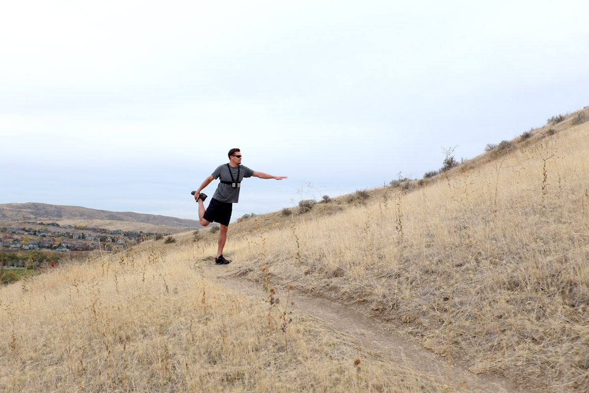 August Johnson stretching on Boise foothill trail