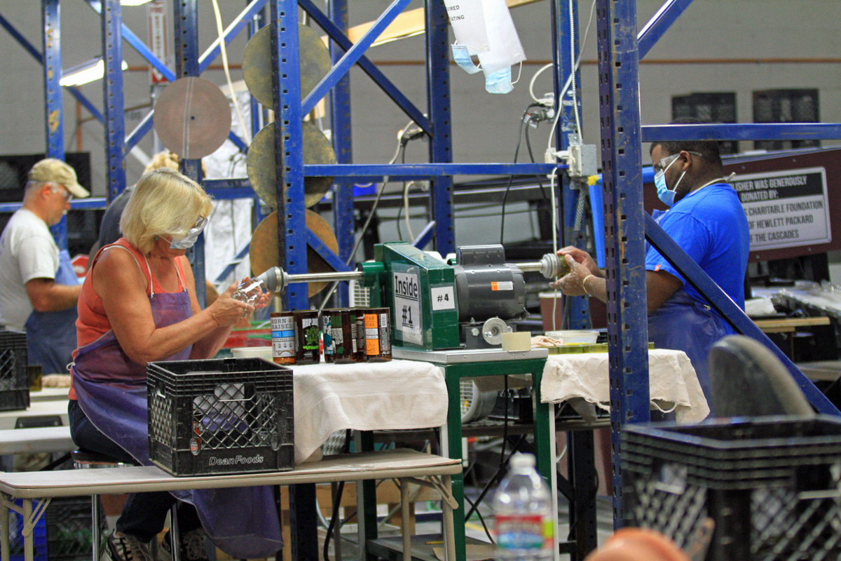 Usful Glassworks volunteer production line