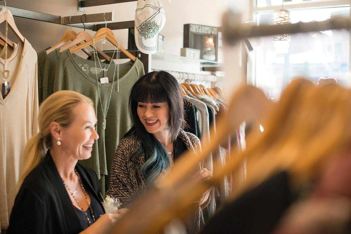 StyleSpyGirl Shopping Tours founder Tanya Carnahan with customer