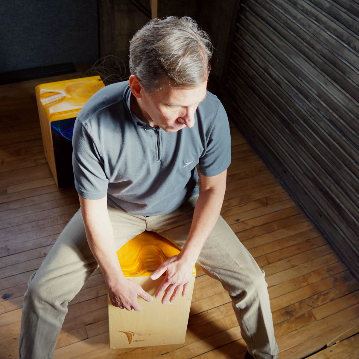 Todd Chavez playing the cajon