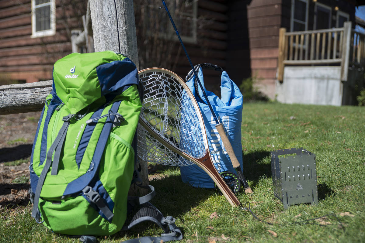 Lone Cone backpack, fishing net and other gear